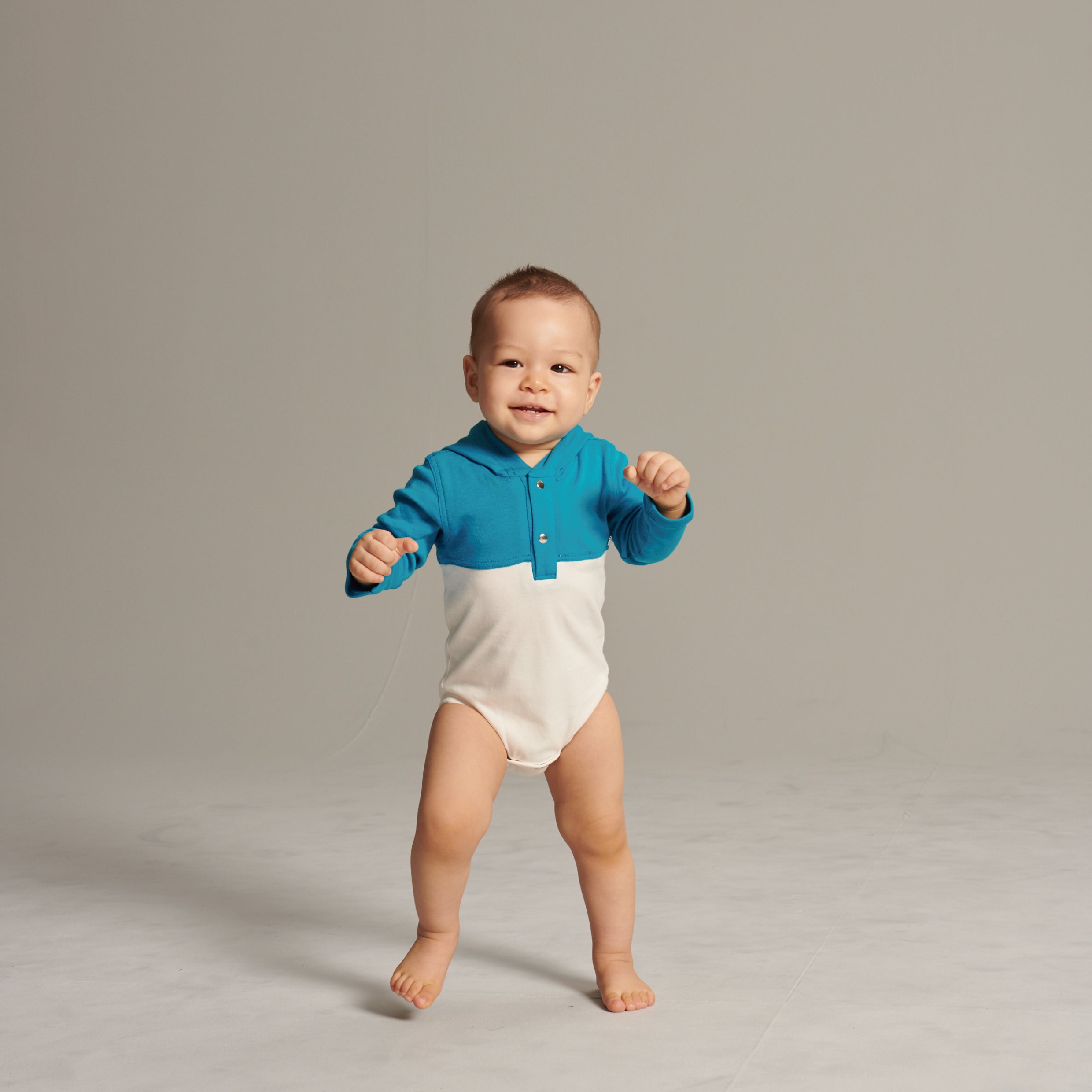 Main | Toddler sports hooded bodysuit | paneled | 100% organic cotton